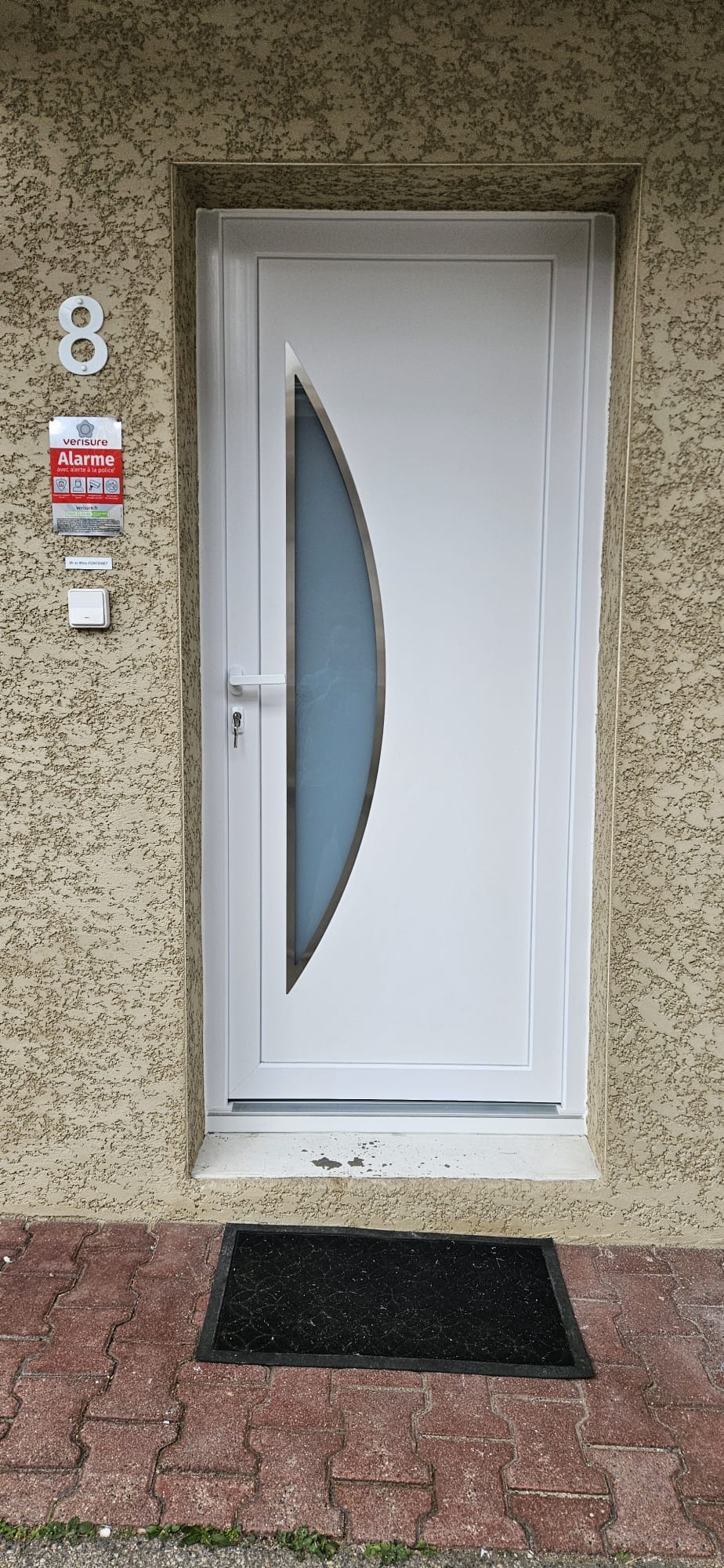 Porte d'entrée PVC posée à Saint-Étienne par SPMC Menuiserie