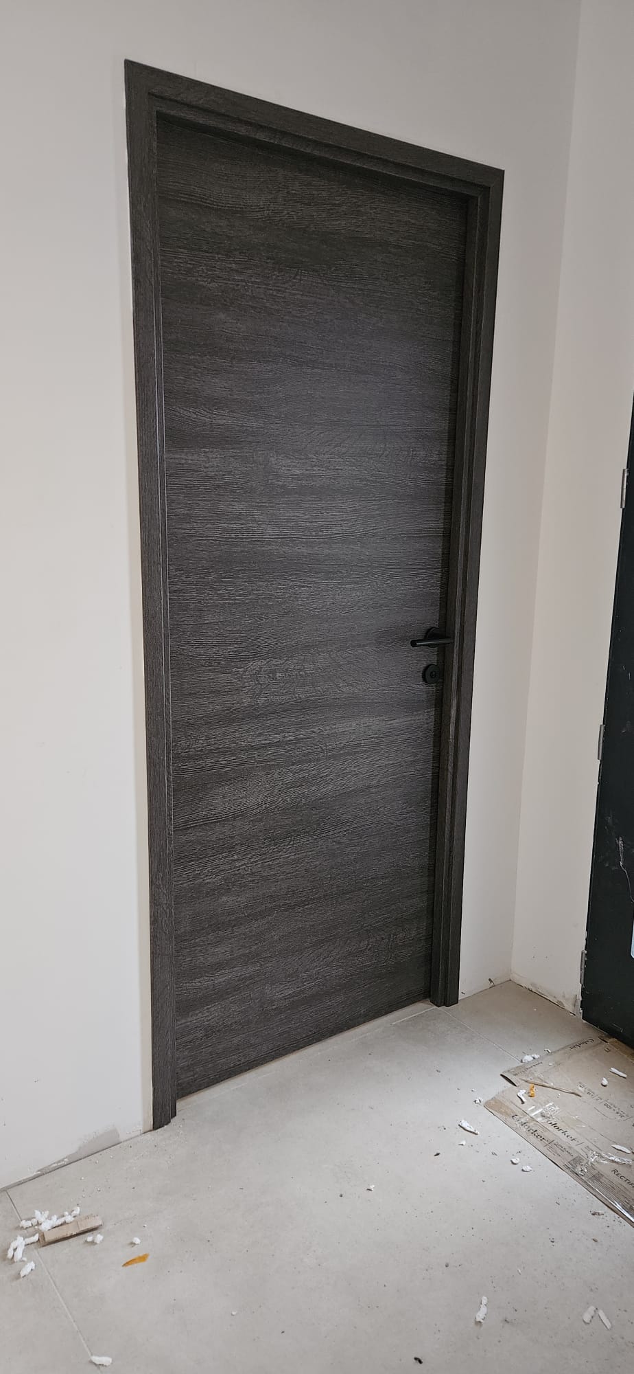 Porte intérieure bois posée par SPMC Menuiserie